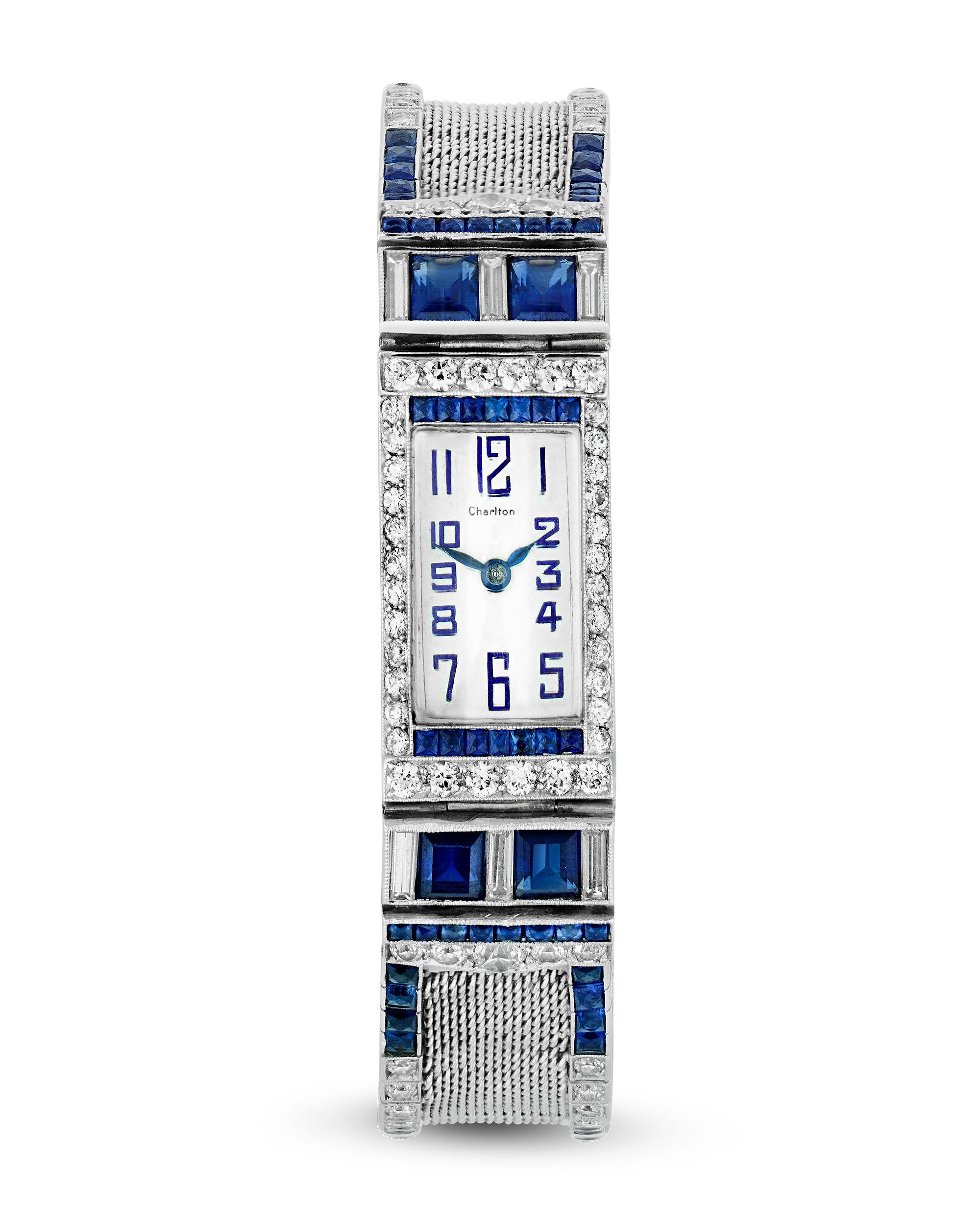 Showcasing the quintessential elegance and geometric grace of the Art Deco period, this timepiece was crafted by renowned watchmaker Patek Philippe for the Deco-era jeweler Charlton & Co. The elegant platinum mesh bracelet is set with vibrant blue