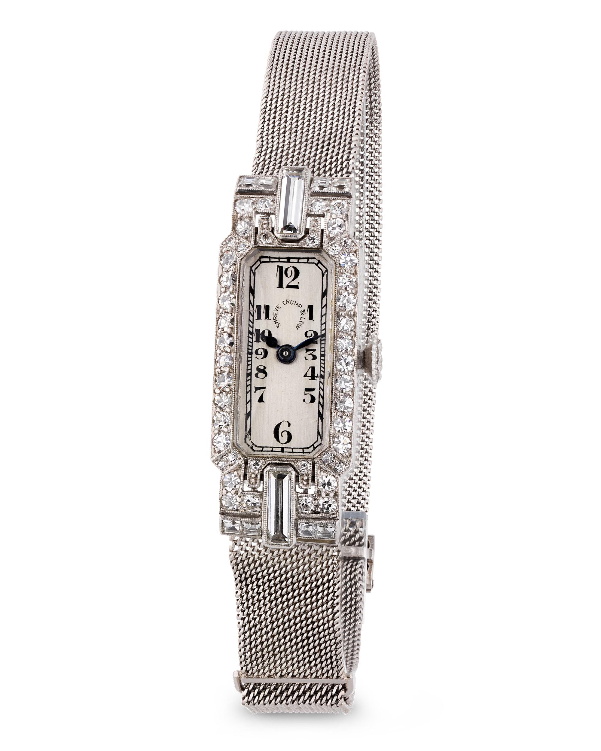 A refined expression of Art Deco horological elegance, this Patek Philippe wristwatch was crafted for the luxury American retailer Shreve, Crump & Low. The sleek platinum case is adorned with 54 baguette, carré and single cut diamonds totaling 1.90