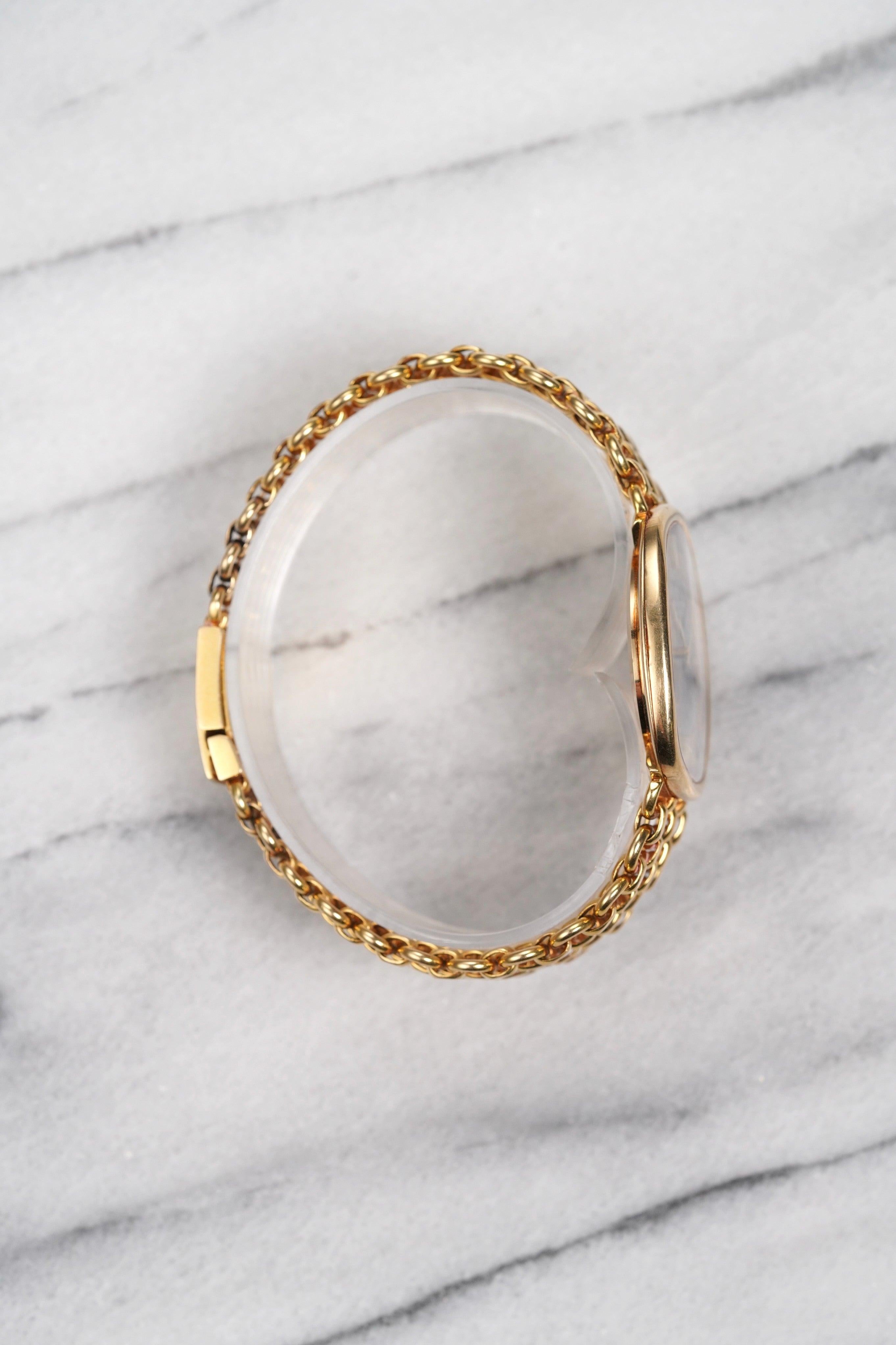 Here’s a Patek Philippe Ellipse in 18K yellow gold manual wind cushion case from the 1980s with a sunburst blue sigma dial from the 1980s. Measurements include a 32mm case and a bracelet that fits up to a 7 inch wrist. At 3 and 6 a clock, there are
