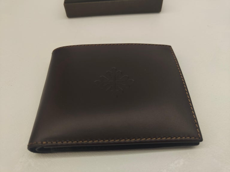 Patek Philippe Brown leather wallet For Sale at 1stDibs