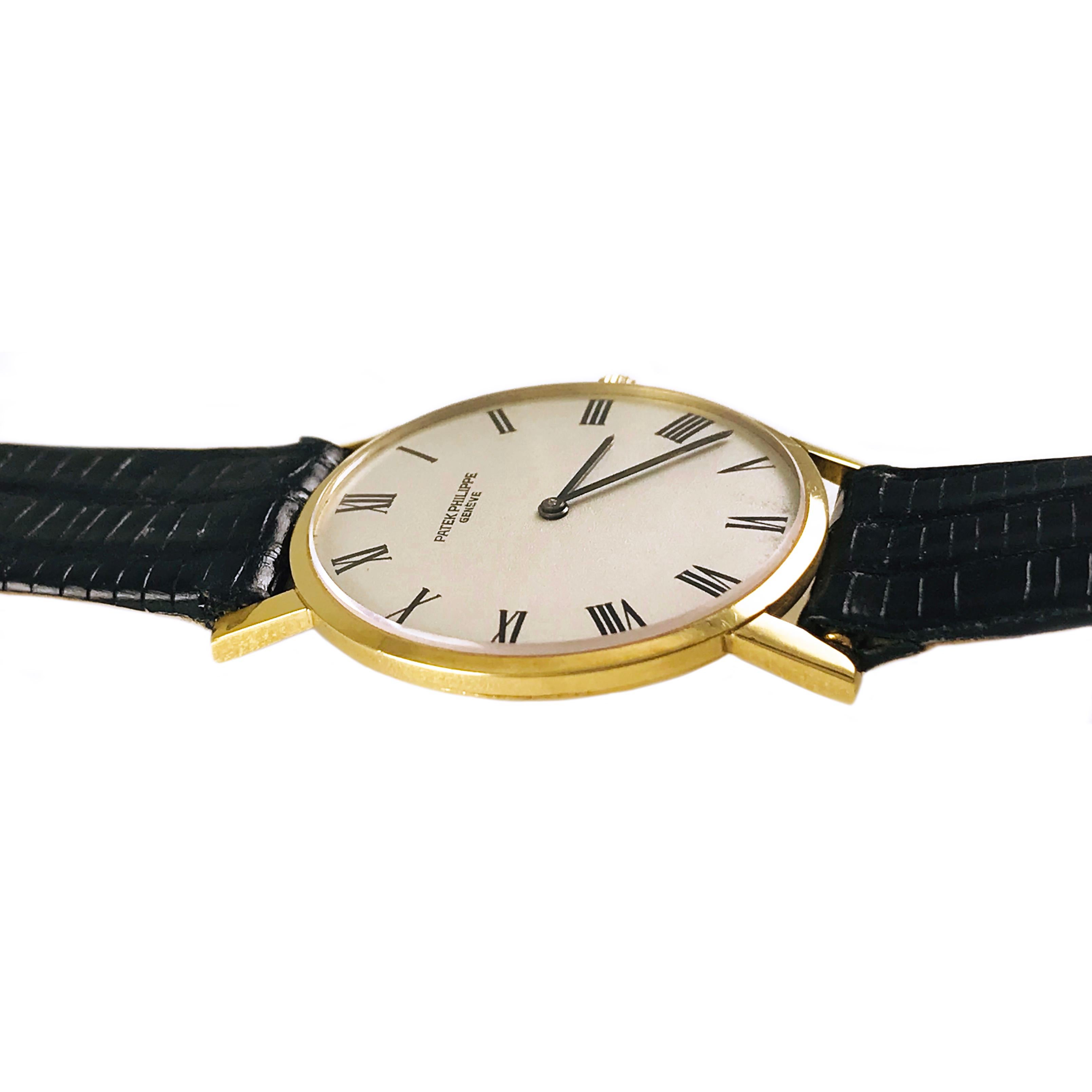 Patek Philippe Calatrava Ultra Thin 18 Karat Yellow Gold, 18 Jewel movement watch. This style watch is considered the flagship model of Patek Philippe. Black baton-style hour and minute hands on dial, manual wind movement. Serial #11324XX, Model