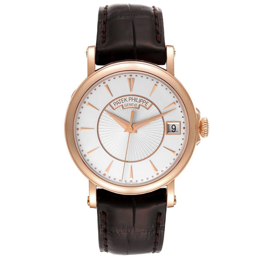 Patek Philippe Calatrava 18k Rose Gold Silver Dial Mens Watch 5153R. Automatic self-winding movement. 18k rose gold case 38.0 mm in diameter. Exhibition sapphire case back with hinged case back cover. 18k rose gold smooth bezel. Scratch resistant