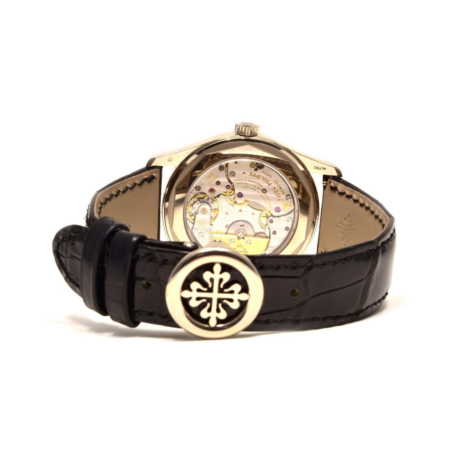Brand: Patek Philippe

Series: Calatrava

Ref No.: 6006g

Movement: Automatic

Case Material: 18k White Gold

Case Size:  39  mm

Dial:  Black Dial, White Arabic index markers

Crystal: Scratch Resistant Sapphire 

Bracelet Material: Leather