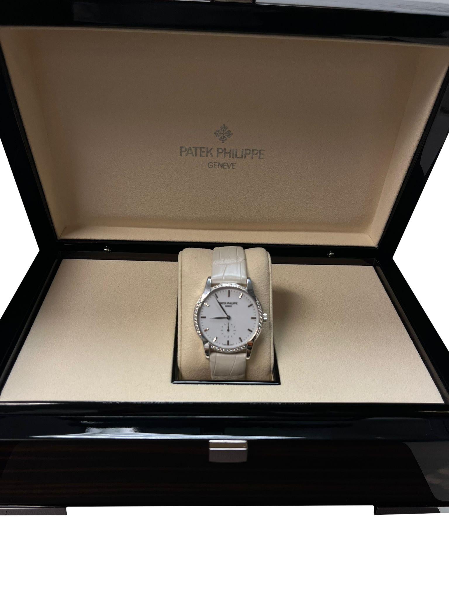 Round Cut Patek Philippe Calatrava 18K White Gold Diamond Bezel Ladies Watch 7122/200G-001 For Sale