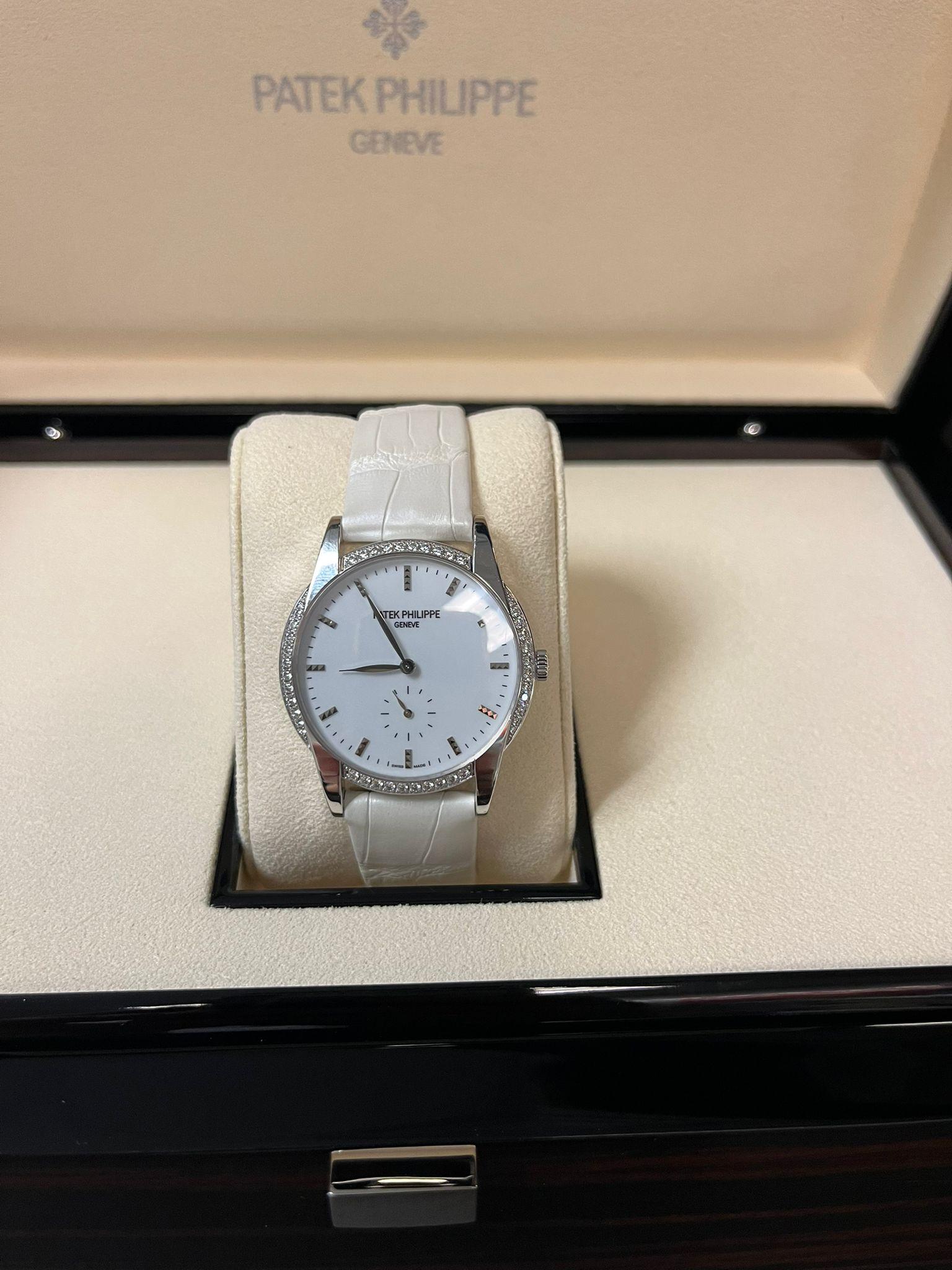 Women's Patek Philippe Calatrava 18K White Gold Diamond Bezel Ladies Watch 7122/200G-001 For Sale