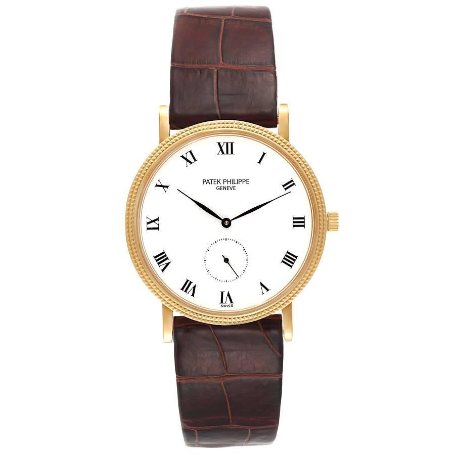 Patek Philippe Calatrava 18k Yellow Gold Brown Strap Mens Watch 3919. Manual winding movement. Rhodium plated, fausses cotes decoration, straight-line lever escapement, Gyromax balance adjusted to heat, cold, isochronism and 5 positions, shock