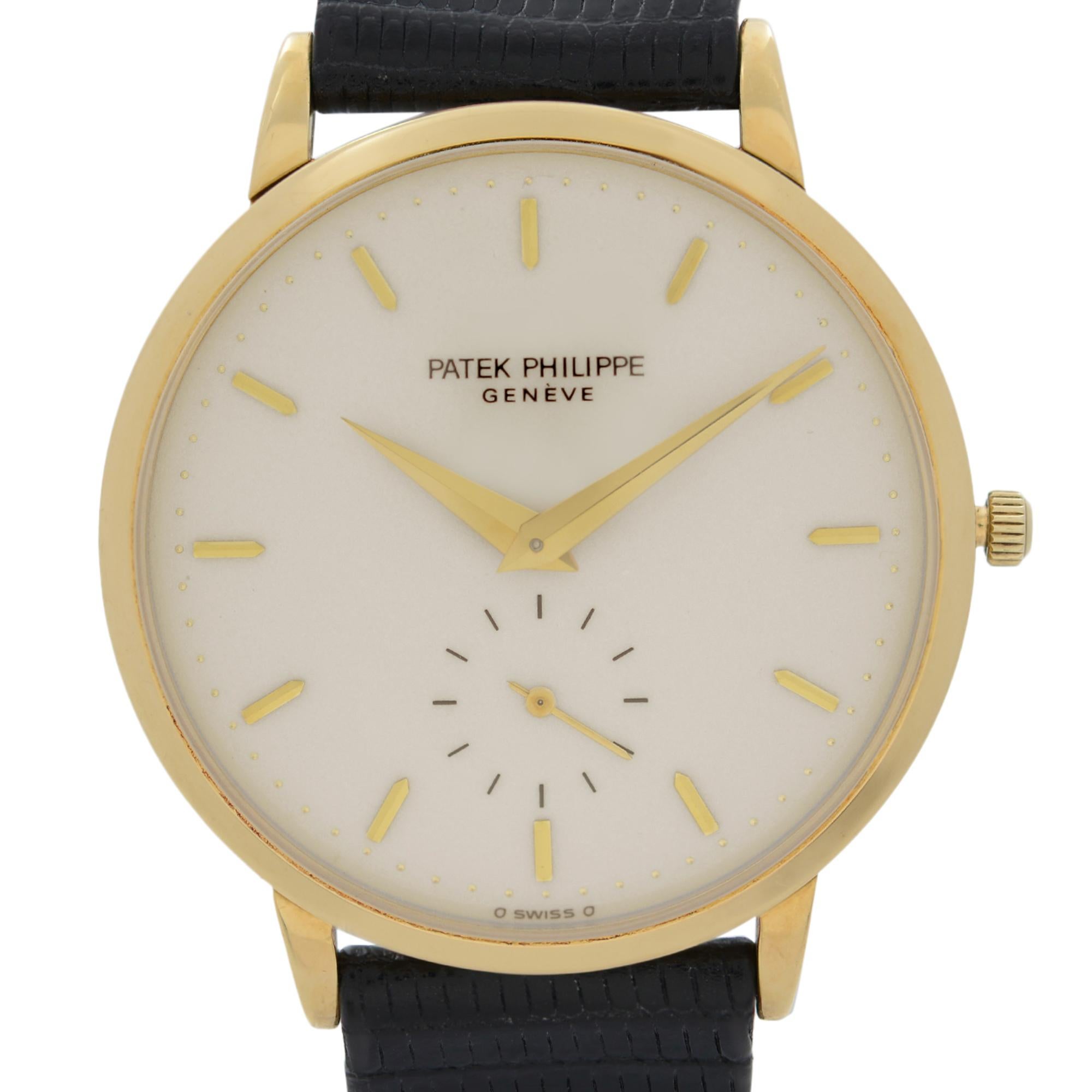 Pre-Owned Patek Philippe Calatrava 33 mm 18k Yellow Gold Cream Sigma Dial Men's Automatic Watch 3893J. The Watch is powered by an Automatic Movement and Features: Polished 18k Yellow Gold Round Case and Two-Piece Leather Strap. Fixed Gold Bezel.