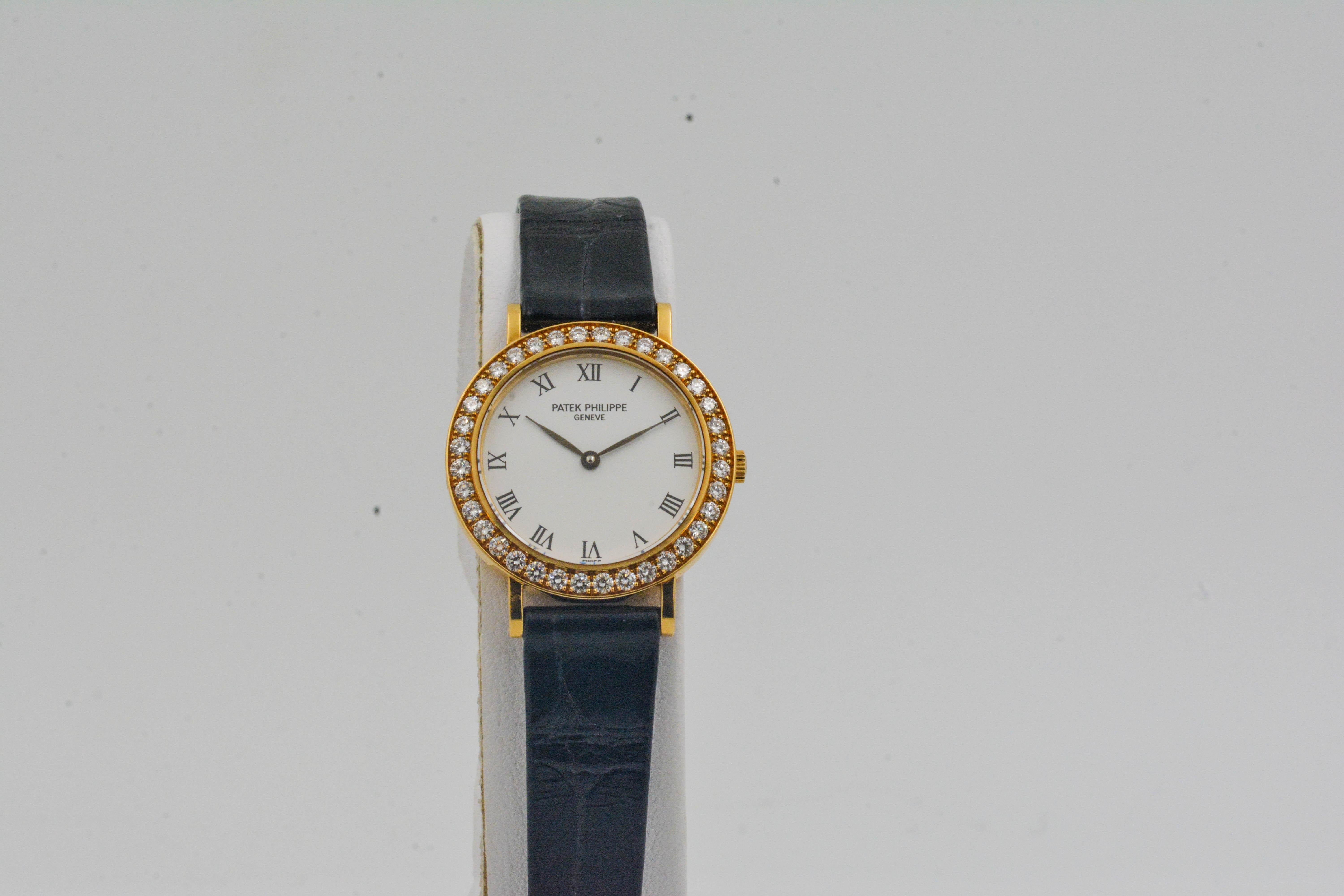 • Model: Calatrava Ladies
• Movement: Quartz, water resistant 
• Case Size: 25mm 
• Case Material: 18K yellow gold, 36 round brilliant diamond bezel (0.80ctw)
• Dial: White with sapphire crystal glass 
• Strap: Black alligator leather  
•