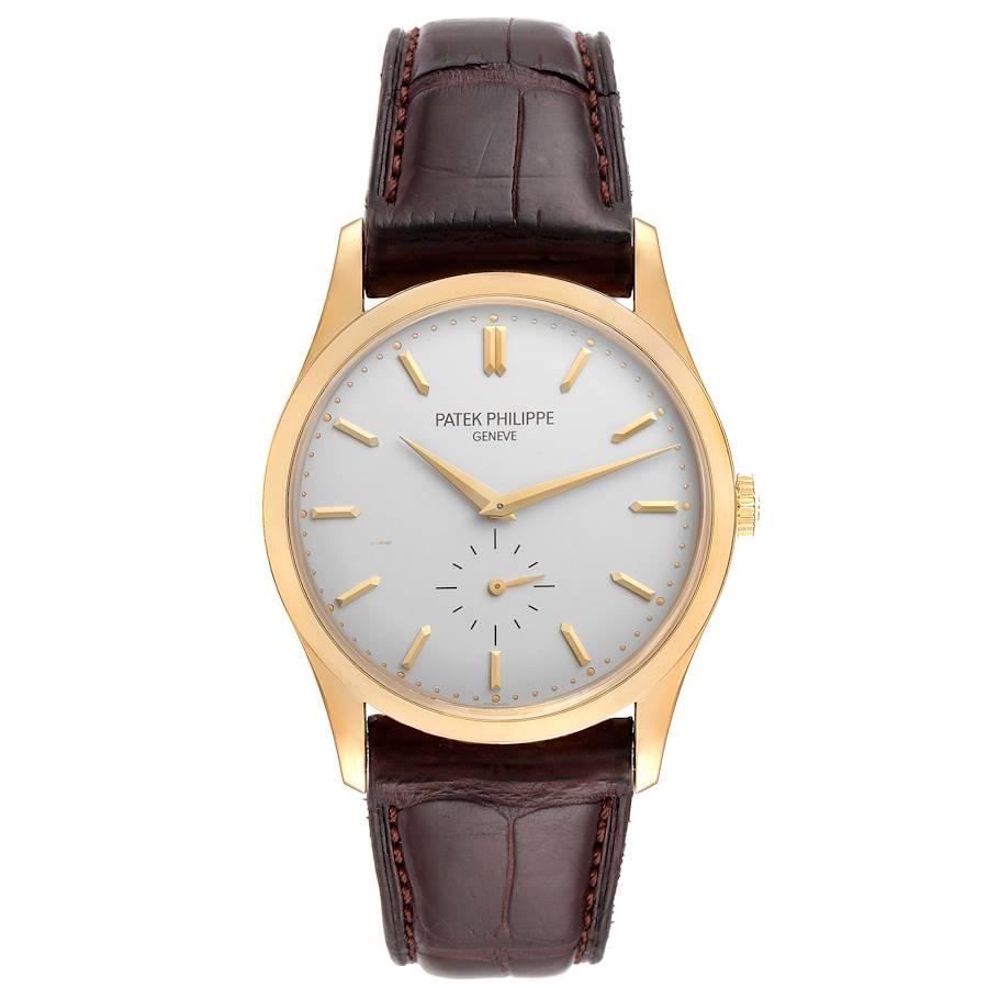 Patek Philippe Calatrava 18k Yellow Gold Silver Dial Mens Watch 5196. Manual-winding movement. Rhodium-plated, fausses cotes decoration, straight-line lever escapement, Gyromax balance adjusted to heat, cold, isochronism and 5 positions, shock