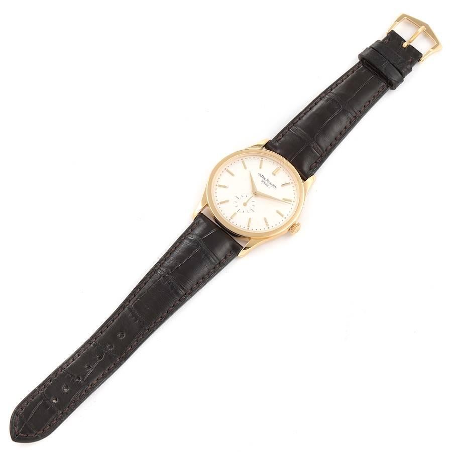 Herrenuhr mit 18 Karat Gelbgold und Silber Zifferblatt von Patek Philippe Calatrava 5196 im Angebot 6