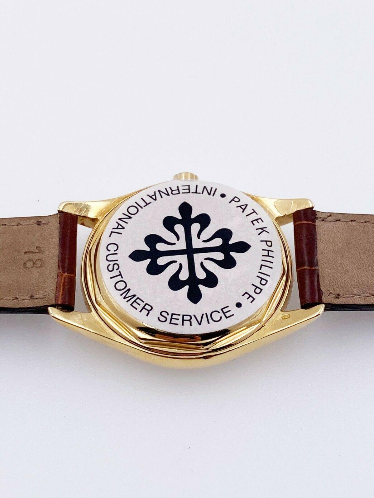 18 Karat Gelbgold Kasten-Service-Papier von Patek Philippe Calatrava 2526J im Angebot 5