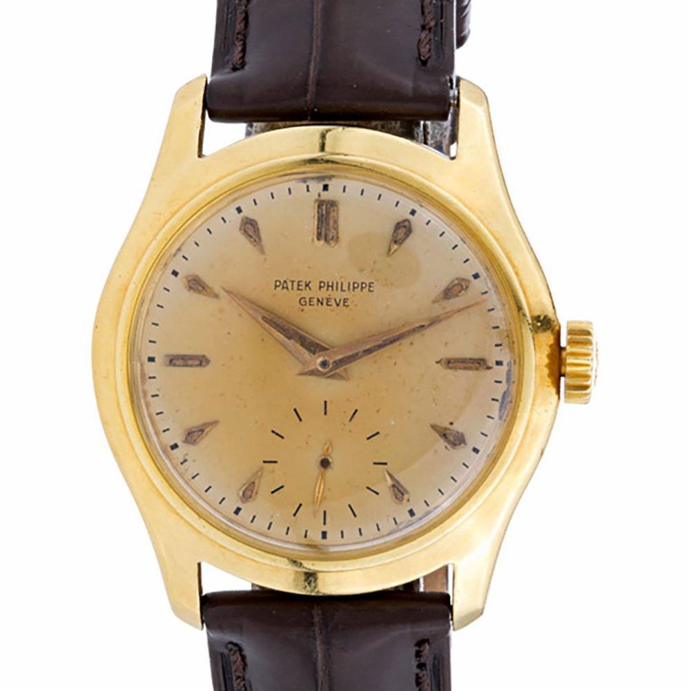 Patek Philippe Calatrava Reference #:2532. Vintage Patek Philippe Calatrava in 18k yellow gold. Manual wind with subseconds. Complete with Archive papers. Original toned dial. Ref 2532. Circa 1955. Fine Pre-owned Patek Philippe Watch. Certified