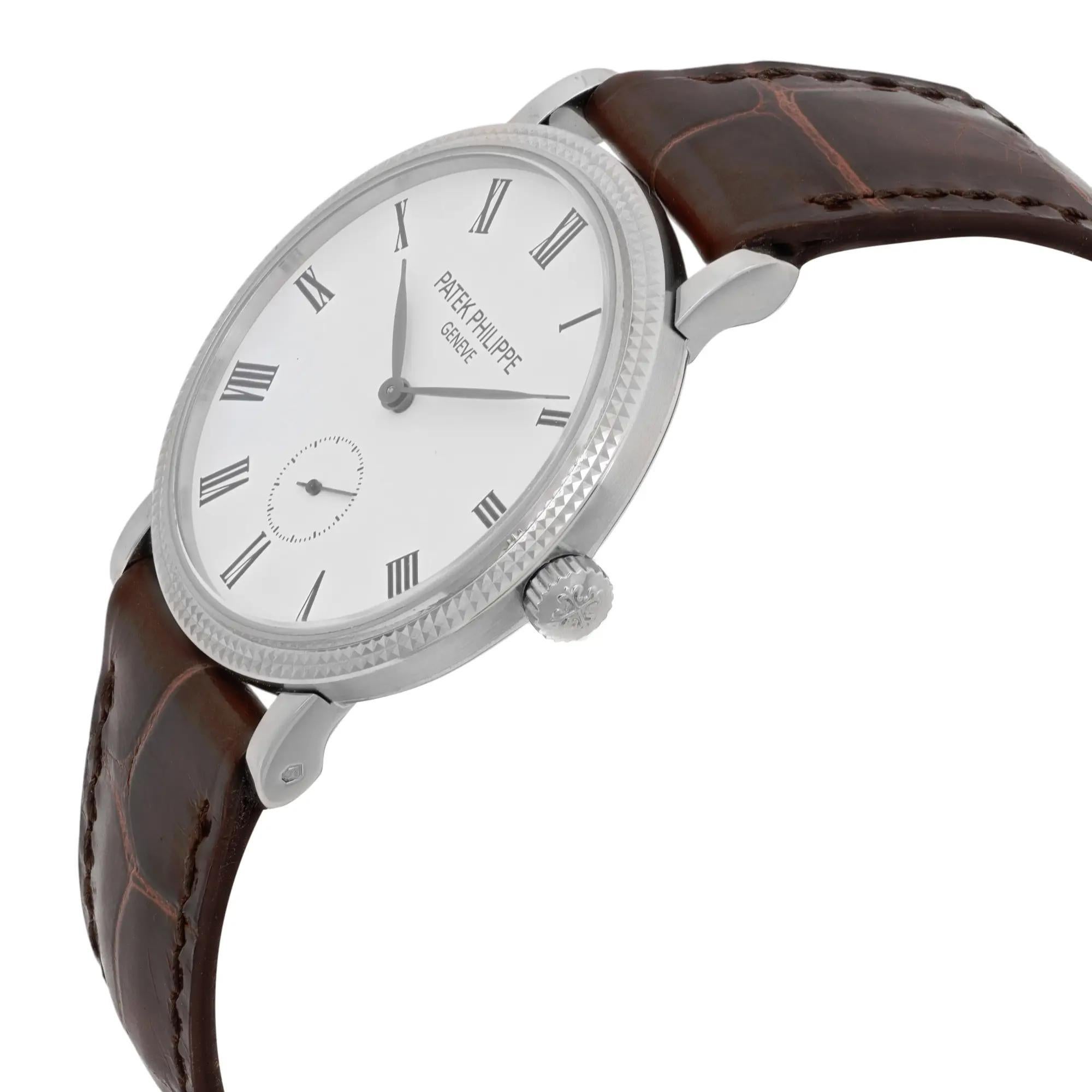Patek Philippe Calatrava 31mm 18K White Gold White Dial Watch 7119G In Good Condition For Sale In New York, NY