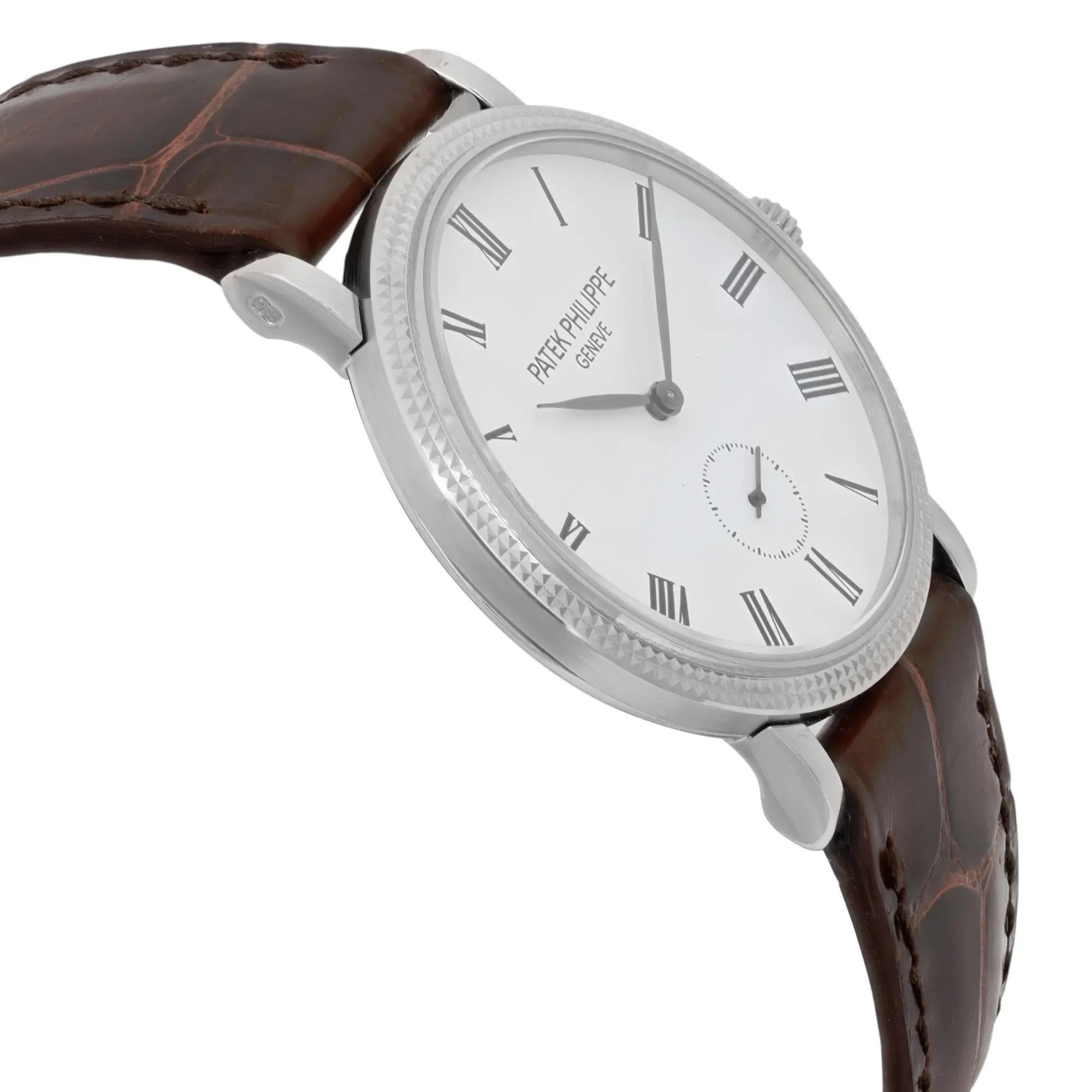 Women's or Men's Patek Philippe Calatrava 31mm 18K White Gold White Dial Watch 7119G For Sale