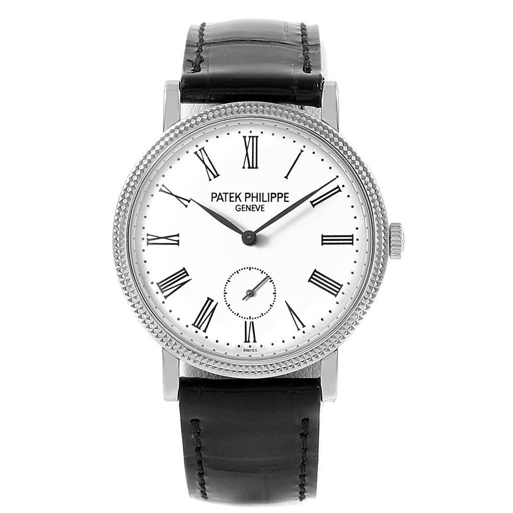Patek Philippe Calatrava 31mm White Gold Ladies Watch 7119G Box Papers. Manual-winding movement. 18k white gold case 31.0 mm in diameter. Exhibition sapphire crystal case back. 18k white gold hobnail decorated bezel. Scratch resistant sapphire