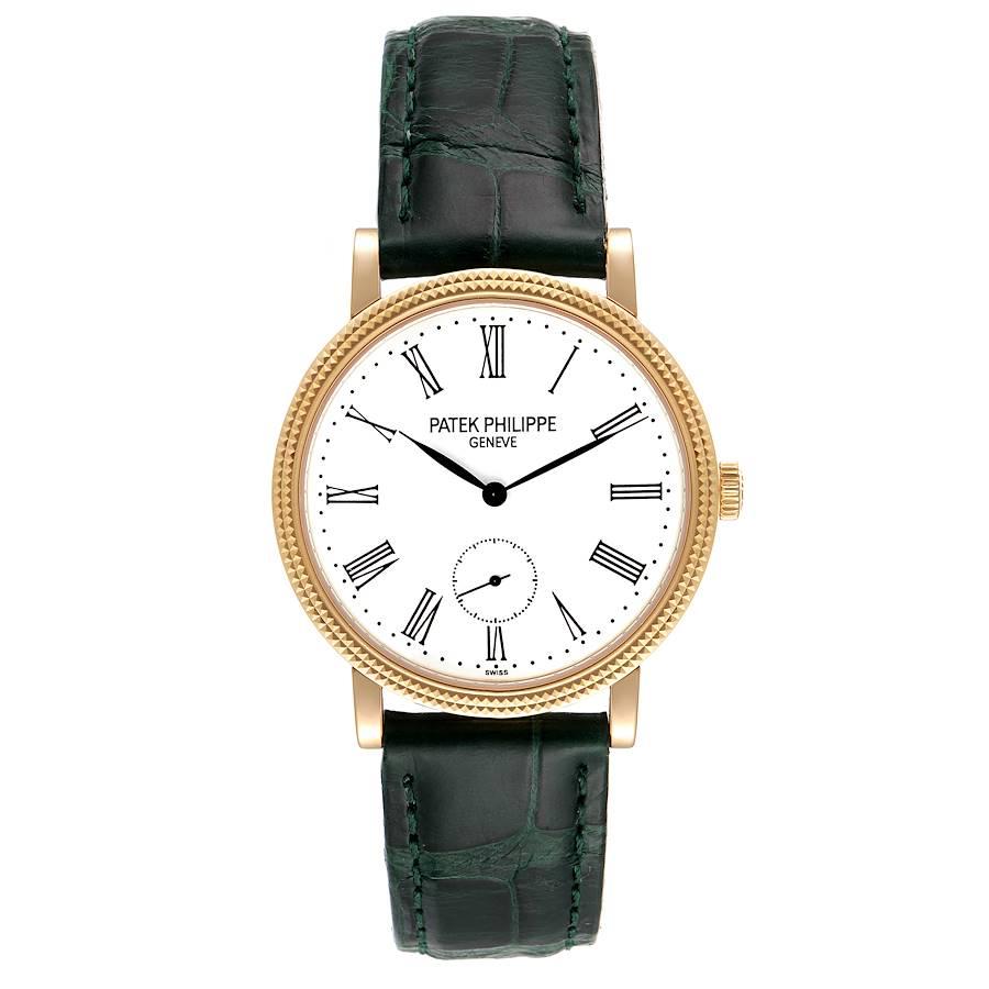 Patek Philippe Calatrava 31mm Yellow Gold Green Strap Ladies Watch 7119. Manual winding movement. 18k yellow gold case 31.0 mm in diameter. Exhibition sapphire crystal case back. 18k yellow gold hobnail decorated bezel. Scratch resistant sapphire