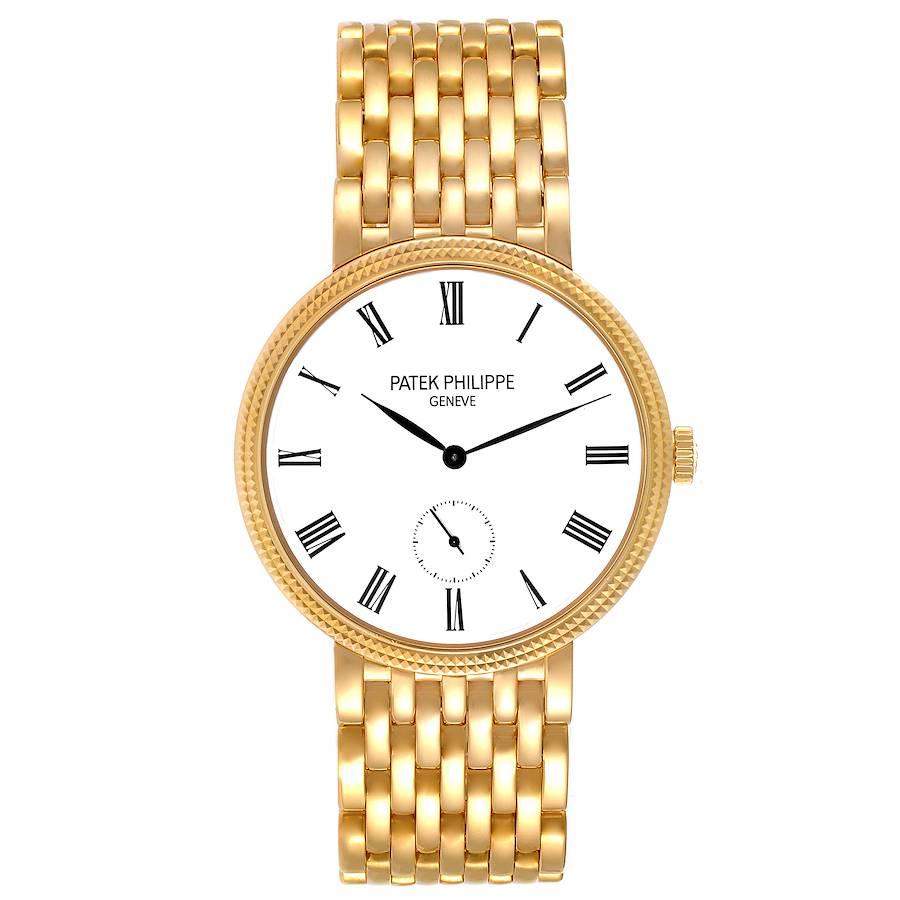 Patek Philippe Calatrava 31mm Gelbgold Damenuhr 7119. Uhrwerk mit Handaufzug. gehäuse aus 18 Karat Gelbgold mit einem Durchmesser von 31,0 mm. Gehäuseboden aus Saphirglas. lünette mit Hobnail-Dekor aus 18 Karat Gelbgold. Kratzfestes Saphirglas.