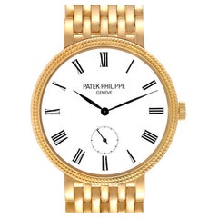 Damenuhr 7119 von Patek Philippe Calatrava aus Gelbgold