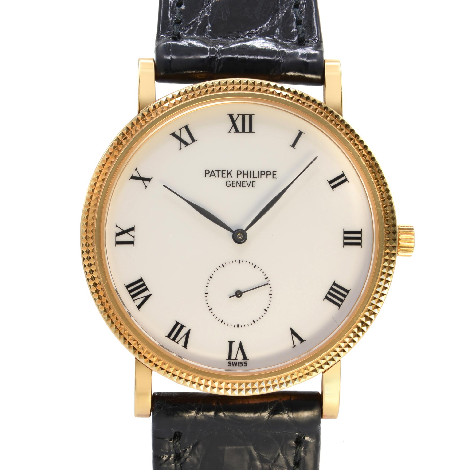 Pre-Owned Patek Philippe Calatrava 33 mm 18k Yellow  Gold White Dial Men's Hand-Wind Watch 3919J. The Watch is powered by Hand Winding Movement and Features: an 18k Yellow Gold Round Case and Two-Piece Leather Strap. Fixed Gold Bezel. White Dial