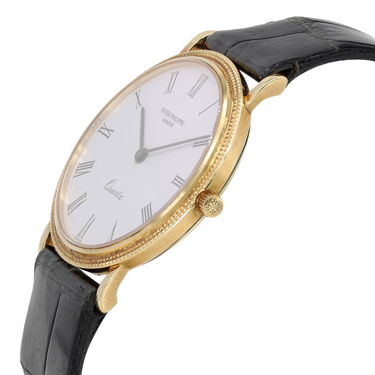 Patek Philippe Calatrava 33mm 18k Gold White Dial Mens Quartz Watch 3744J In Good Condition For Sale In New York, NY
