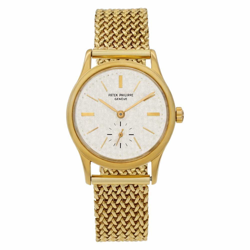 Patek Philippe Calatrava Reference #:3403. Vintage and rare Patek Philippe Calatrava in 18k on mesh custom 10k band, 30 jewels and gold applied sticks. Triangular lugs. Auto w/ subseconds. Ref 3403. Collectible! Circa 1956. Fine Pre-owned Patek