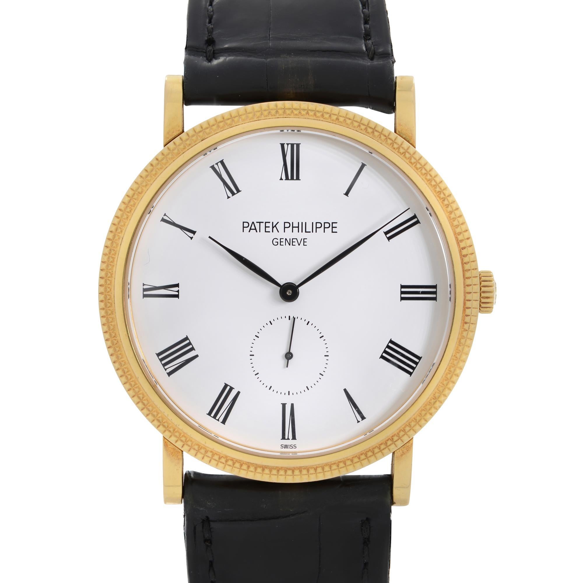 Pre-owned Patek Philippe Calatrava Yellow Gold White Roman Dial Hand Wind Watch 5119J-001. Stains, and Wear Shown on the Leather Strap. This Timepiece is Powered by a Hand Wind Movement and Features: Round 18k Yellow Gold Case with A Black Leather