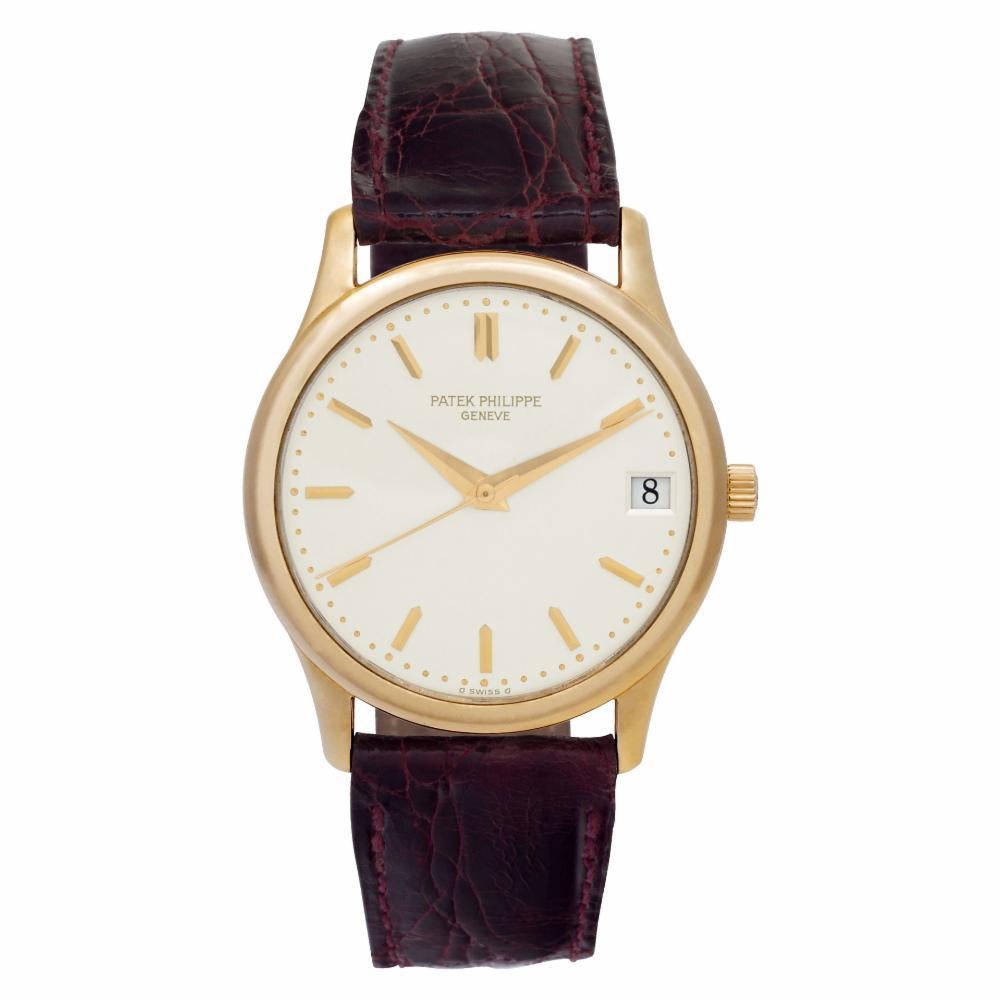Patek Philippe Calatrava Reference #:3998. Patek Philippe Calatrava in 18k on leather strap with 18k gold Patek Philippe tang buckle. Auto w/ sweep seconds and date. With archive papers. Ref 3998. Circa 1991. Fine Pre-owned Patek Philippe Watch.