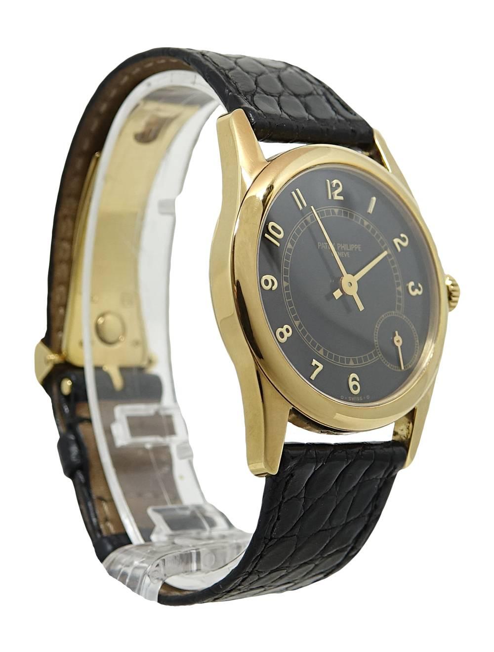 Patek Philippe Calatrava 5000-J Yellow Gold Watch In Excellent Condition For Sale In Naples, FL