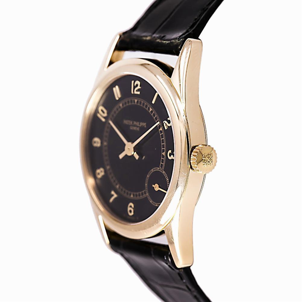 Patek Philippe Calatrava Reference #:5000J. Patek Philippe Calatrava 5000J Mens Automatic Watch 18K Golf Leather Band 33mm. Verified and Certified by WatchFacts. 1 year warranty offered by WatchFacts.
