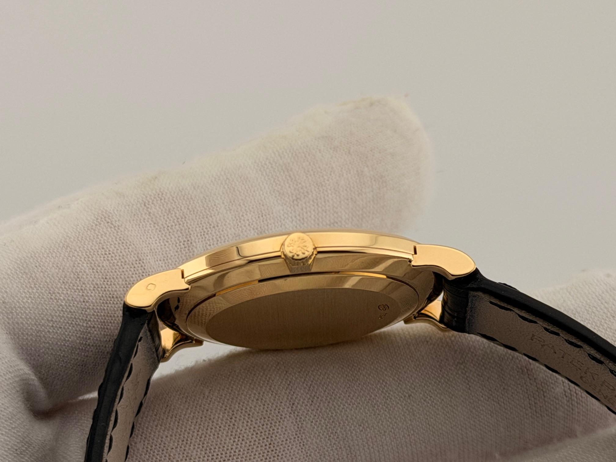 Style Number: 5022

Year: 1997 - 2003
 
Model: Patek Philippe Calatrava
 
Case Material: 18k Yellow Gold 
 
Band: Black Leather
  
Bezel: 18k Yellow Gold 
  
Dial: White Arabic Numeral
 
Crystal: Sapphire
 
Case Size: 33mm
 
Includes: 
-Elegant