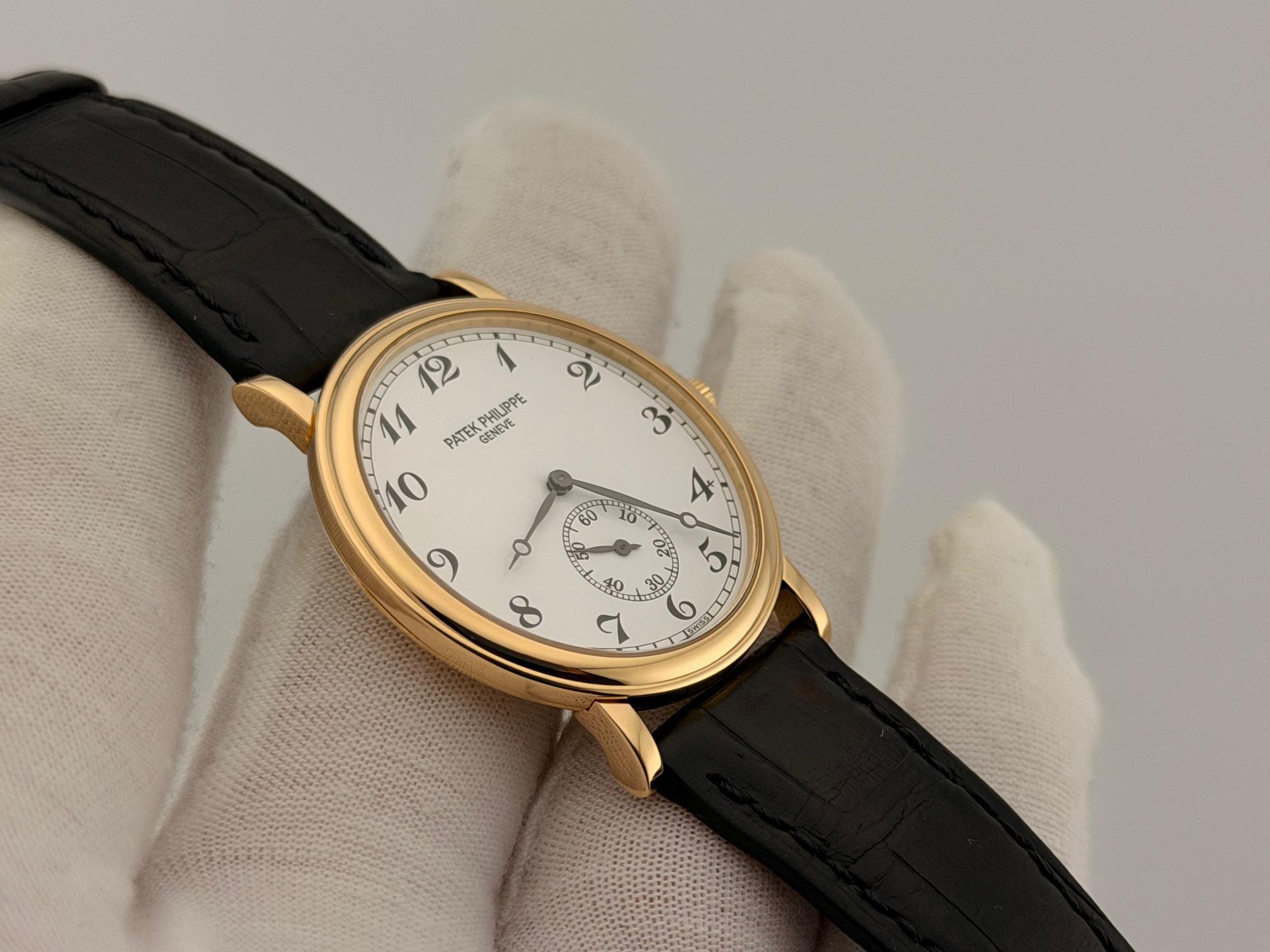 Patek Philippe Calatrava 5022 33mm White Dial Manual Wind 18k Yellow Gold In Good Condition For Sale In San Diego, CA