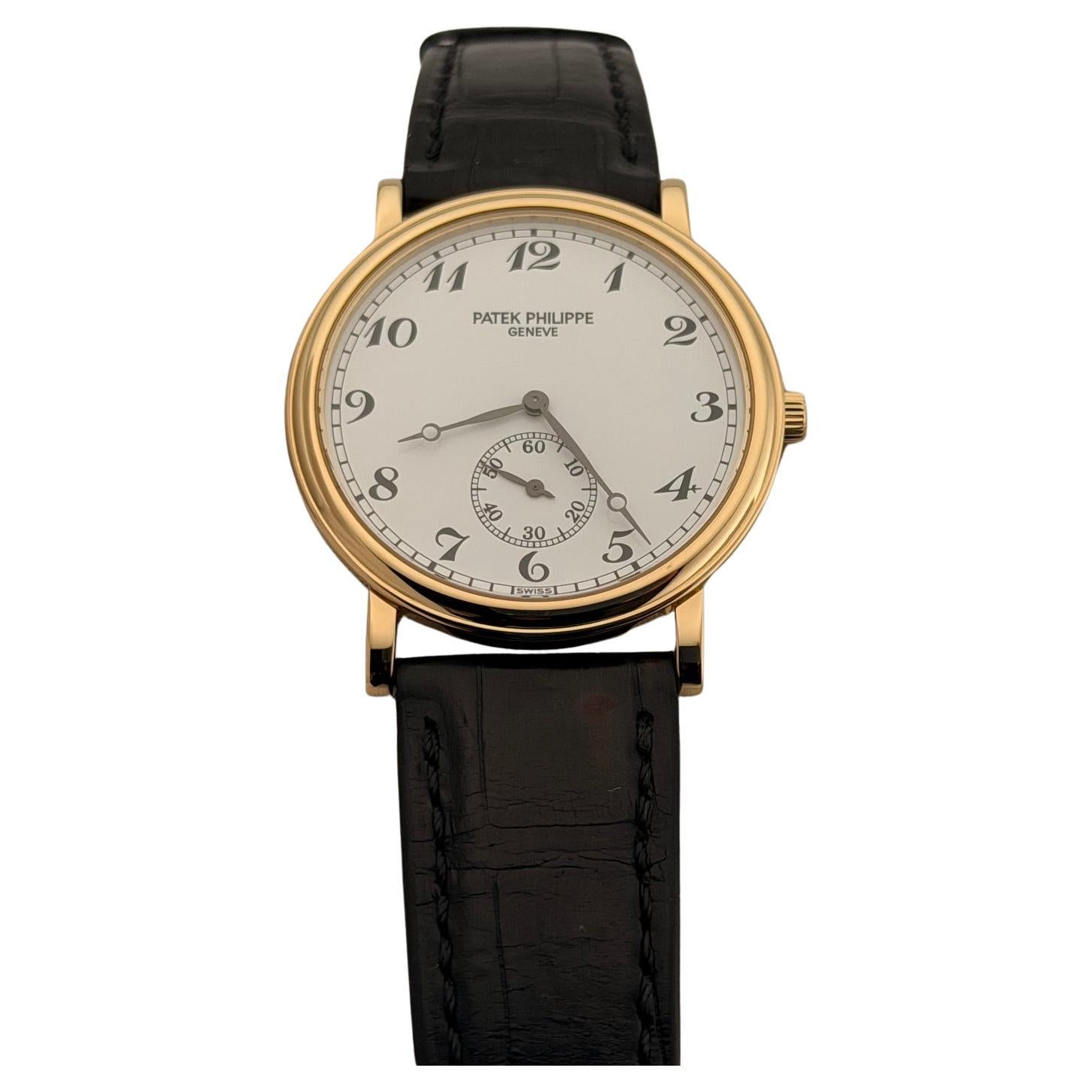 Patek Philippe Calatrava 5022 33mm White Dial Manual Wind 18k Yellow Gold For Sale