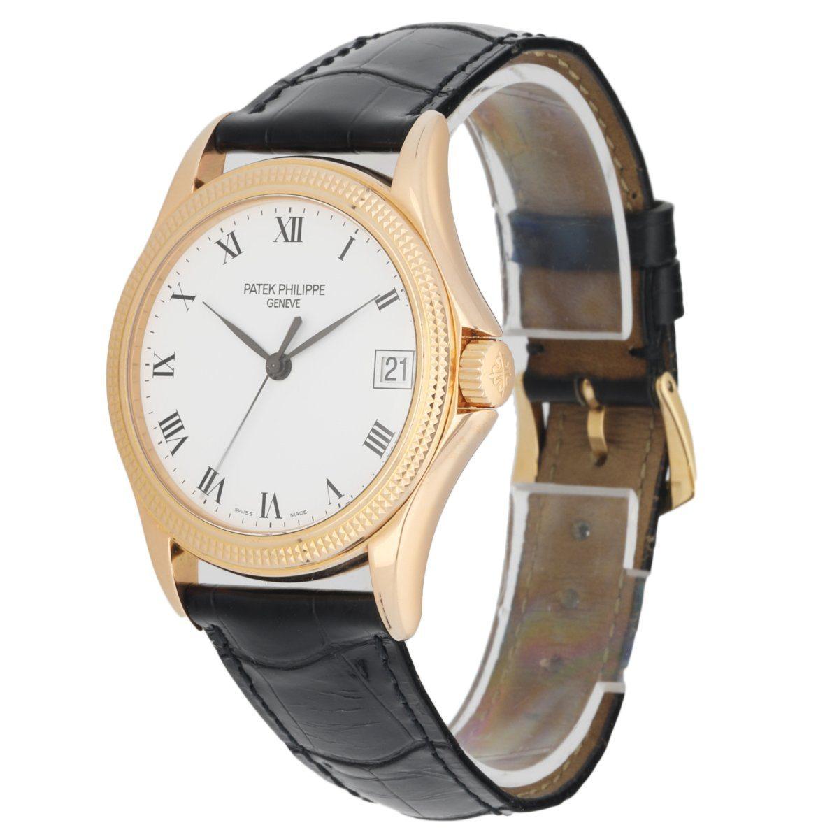Patek Philippe Calatrava 5117R Men's Watch. 36mm 18K rose gold case with 18KÂ rose gold Hobnail patterned bezel. White dial with black steel hands and black Roman numeral hour markers. Date display at 3 o'clock position. Black Alligator Leather