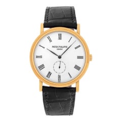 Patek Philippe Calatrava 5119J-001 yellow gold w/ a White dial 36mm Manual watch