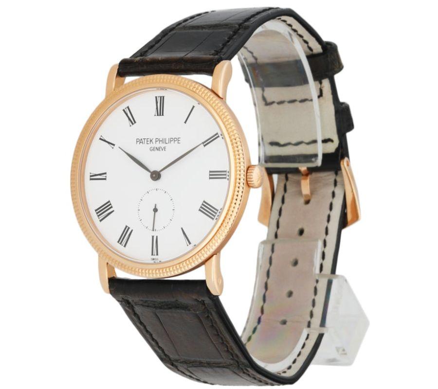 
Patek Philippe Calatrava 5119R Men's Watch. 36mm 18K Rose Gold case with Hobnail patterned bezel. White dial with black steel hands and Roman numeral hour markers. Small second sub-dial. Brown Alligator Leather strap with 18K Rose gold buckle.Will