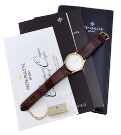 Patek Philippe Calatrava 5196J 18K Yellow Gold Mens Watch Box Papers