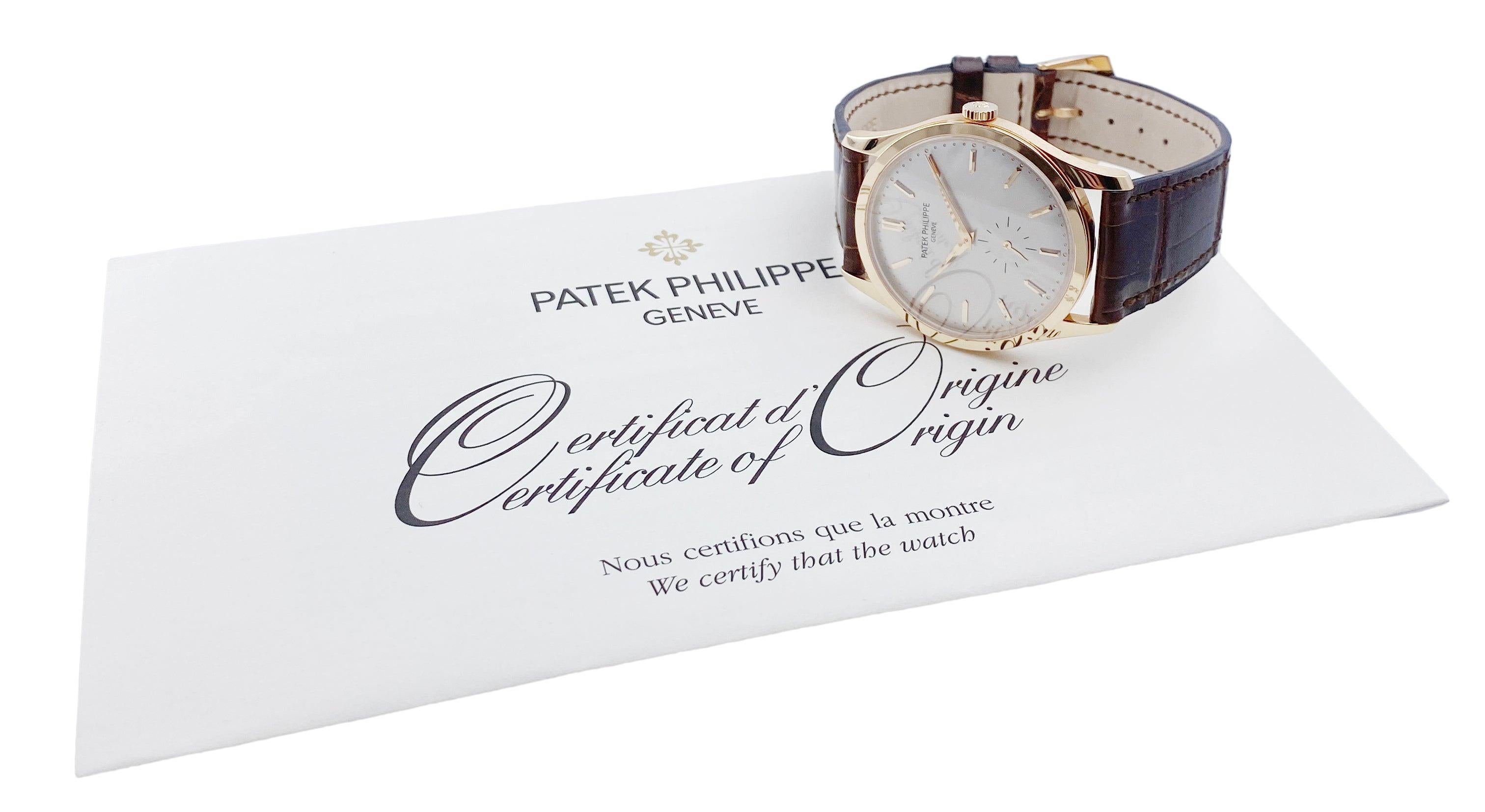 Patek Philippe Calatrava 5196R-001 Mens Watch. 37mm 18K rose gold case with 18K rose gold smoothed bezel. Silver dial with rose gold hands and rose gold index hour marker. Small second sub-dial display between 5 & 7 o'clock position. Brown leather