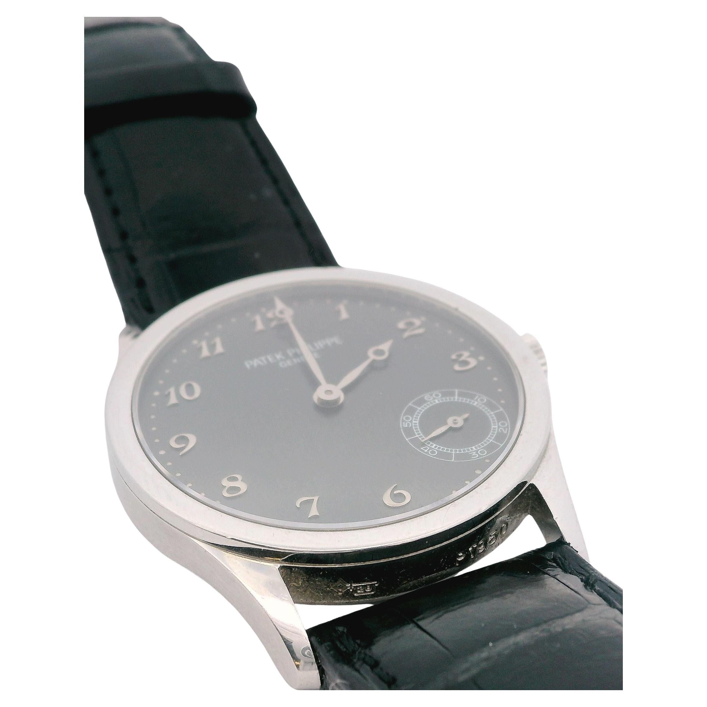 Patek Philippe Calatrava Platinum Gray Dial Automatic Mens Watch 5026P. Movement stamped with the Seal of Geneva quality mark, rhodium-plated, fausses cotes decoration, straight line lever escapement, Gyromax balance adjusted to heat, cold,