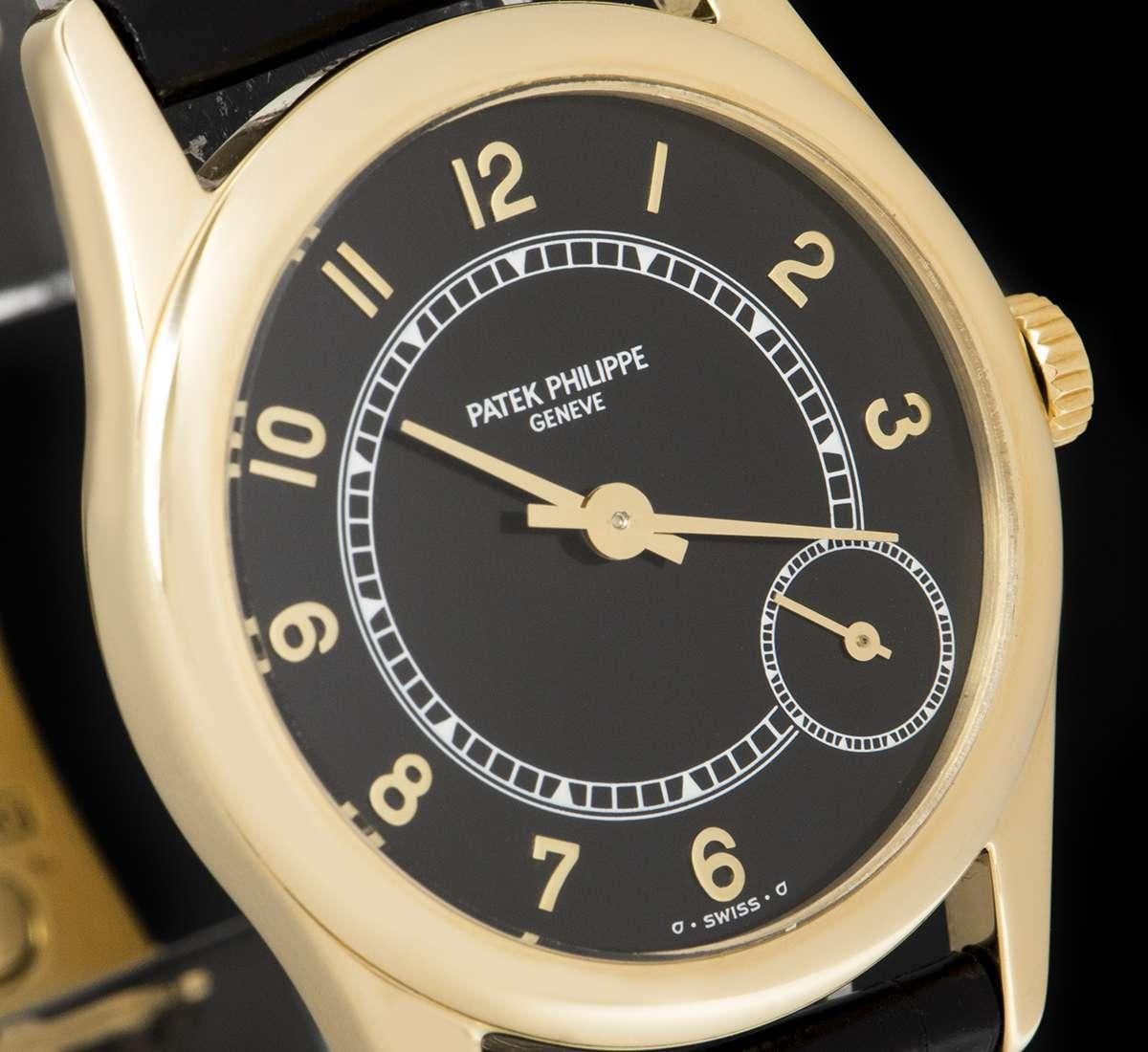 Patek Philippe Calatrava Gents Yellow Gold Black Dial 5000J Automatic Watch In Good Condition In London, GB