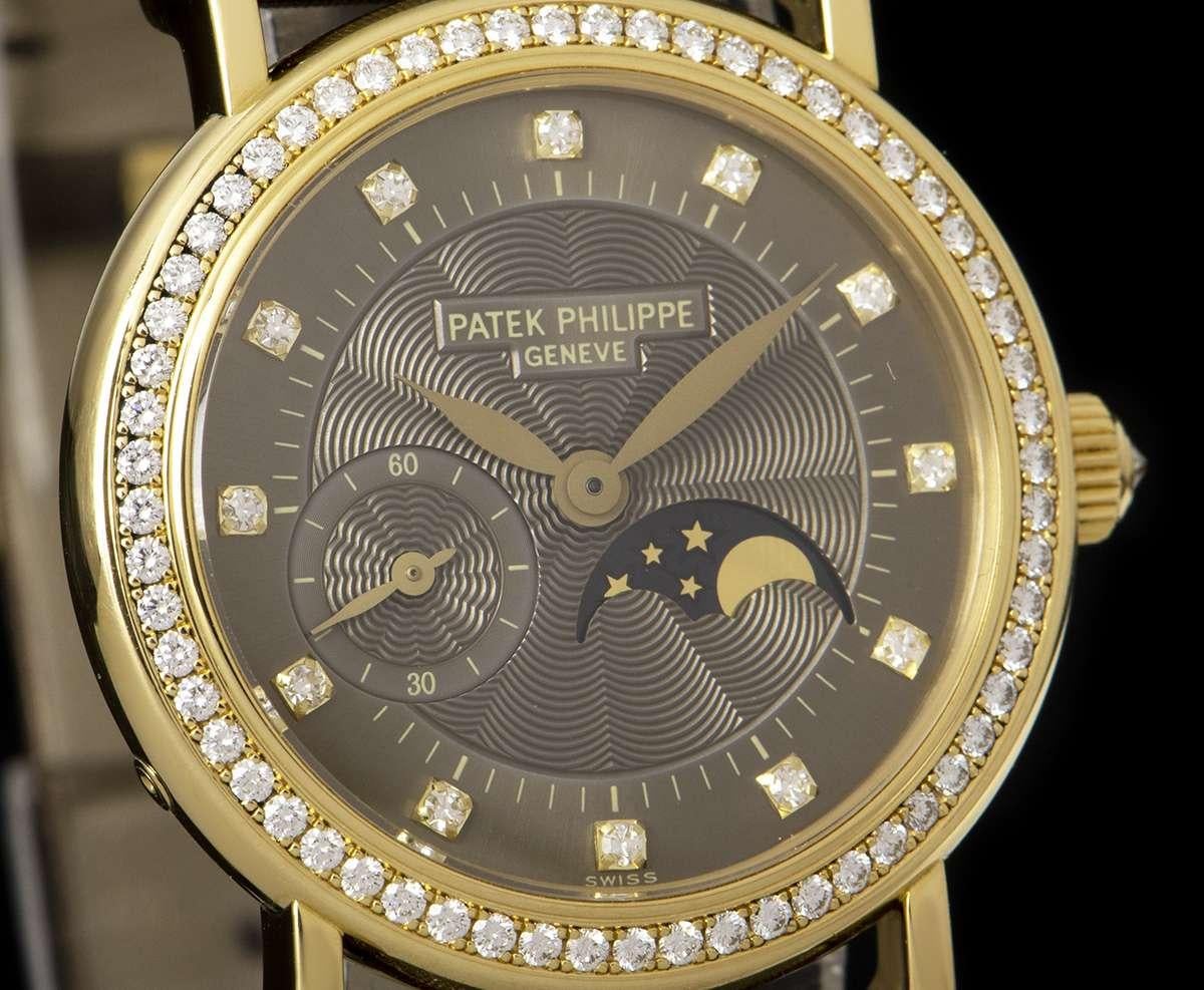 Patek Philippe Calatrava Ladies Gold Brown Dial 4858J Manual Wind Wristwatch In Good Condition In London, GB