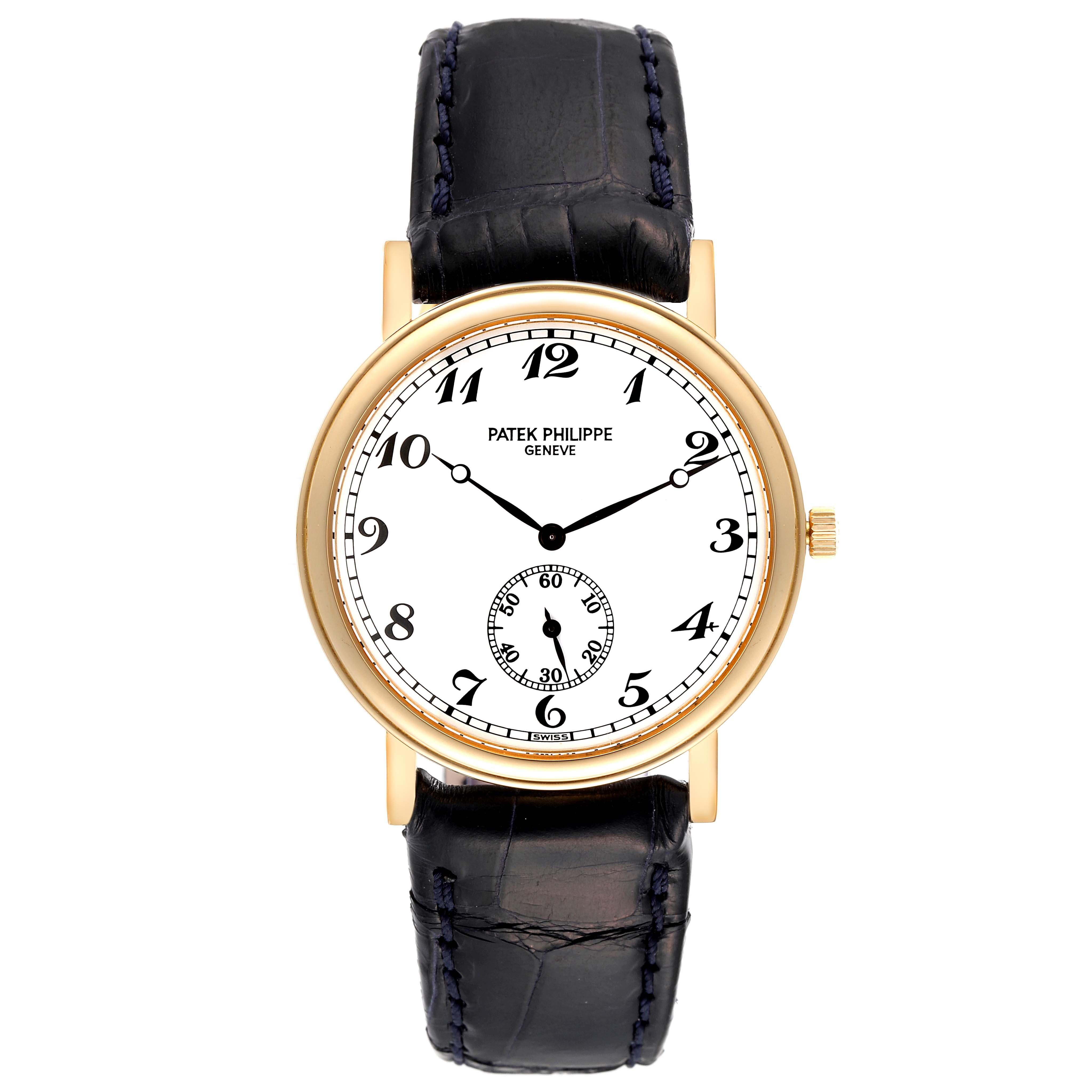 Patek Philippe Calatrava Officer Yellow Gold Mens Watch 5022. Manual winding movement. Rhodium-plated, fausses cotes decoration stamped with the Seal of Geneva quality mark, straight-line lever escapement, Gyromax balance adjusted to heat, cold,