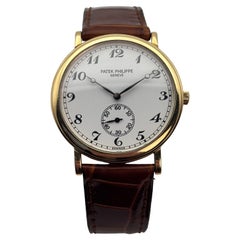 Patek Philippe Calatrava Ref. 5022J Montre en or 18k avec cadran en porcelaine