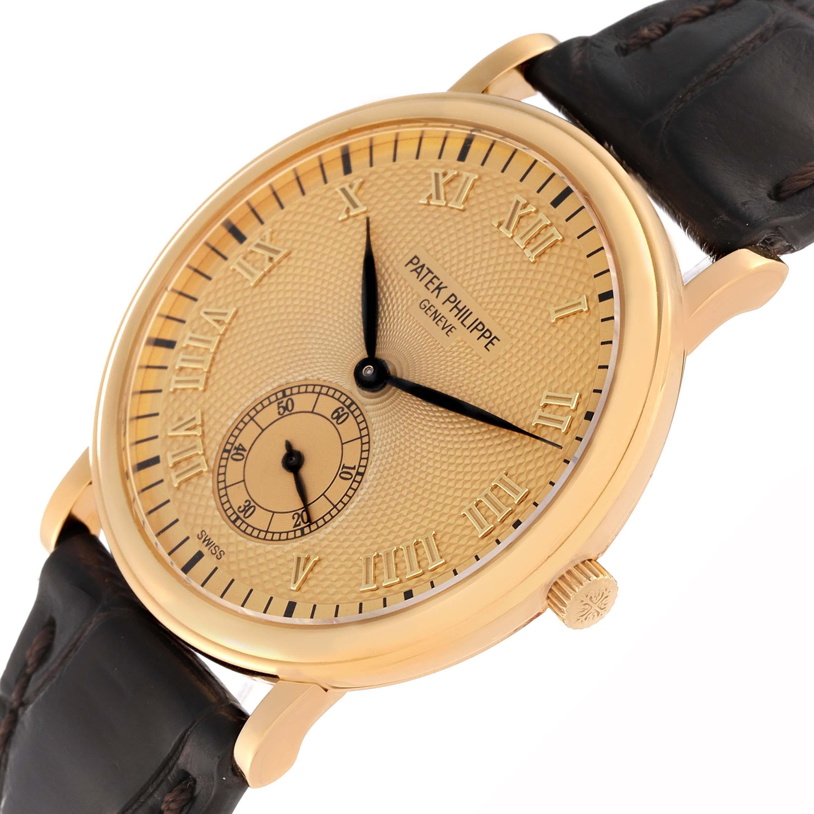 Patek Philippe Calatrava Officier Champagne Dial Yellow Gold Mens Watch 5022 In Excellent Condition For Sale In Atlanta, GA