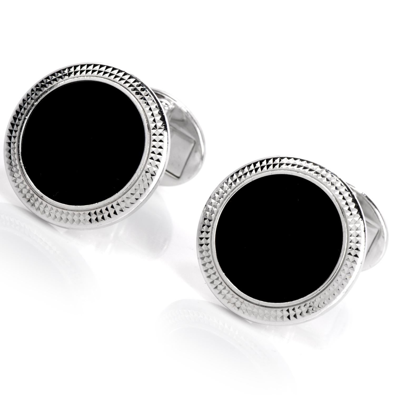 These circa 2000 Patek Philippe Calatrava cufflinks

feature a disc of onyx as a focal

point and crafted in 18K white  gold.

These have a double hobnail bezel design.

Hallmarked and putiry marked.

Measure approx.. 19.04mm diameter.

Highy