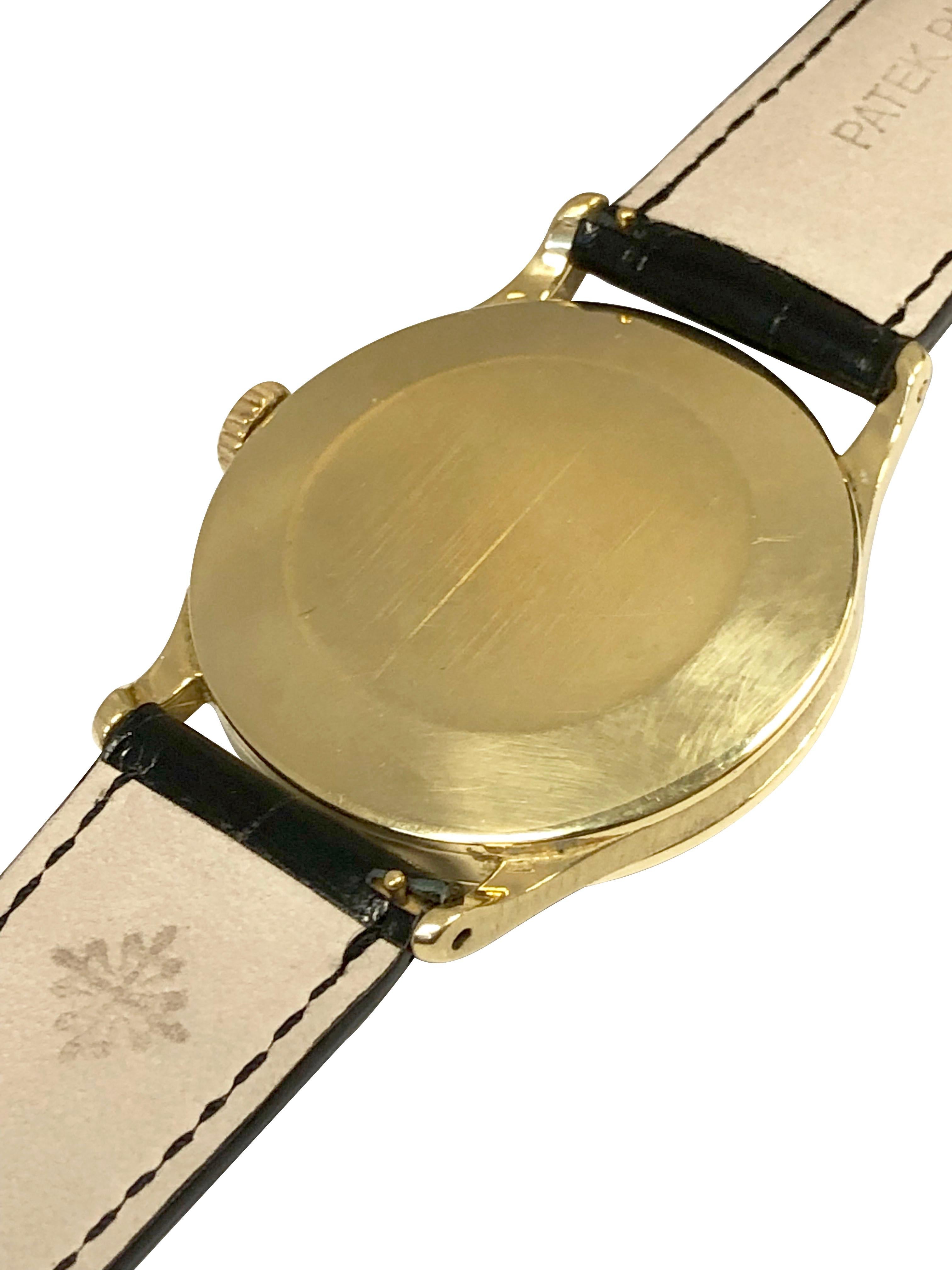 Circa 1960 Reference 570 Patek Philippe Calatrava Wrist Watch, 36 M.M 18k Yellow Gold 3 piece case, 18 jewel mechanical, manual wind movement, Patek Philippe logo crown, original, near excellent silver Satin dial with raised Gold markers and a sweep