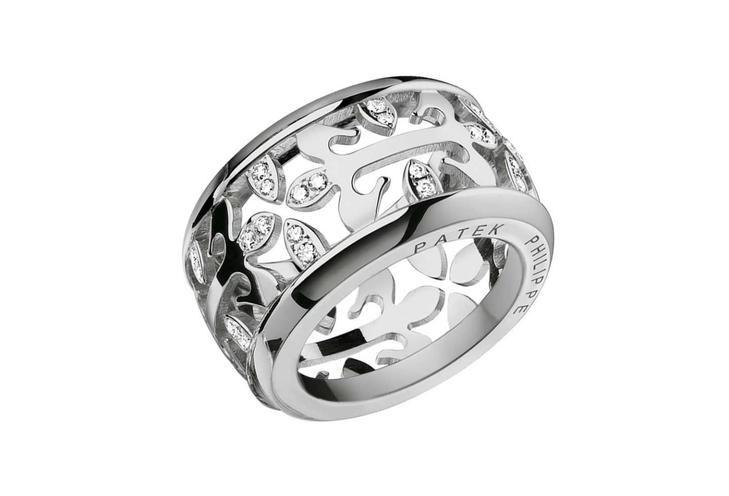 Iconic ring Patek Philippe Calatrava model made in white gold 18 Karat weight 13.90 grams, with 48 diamonds brilliant cut weight 0.36 carats. Engraving outside Patek Phillipe and inside the corresponding punches and measure 52 are observed.
Width