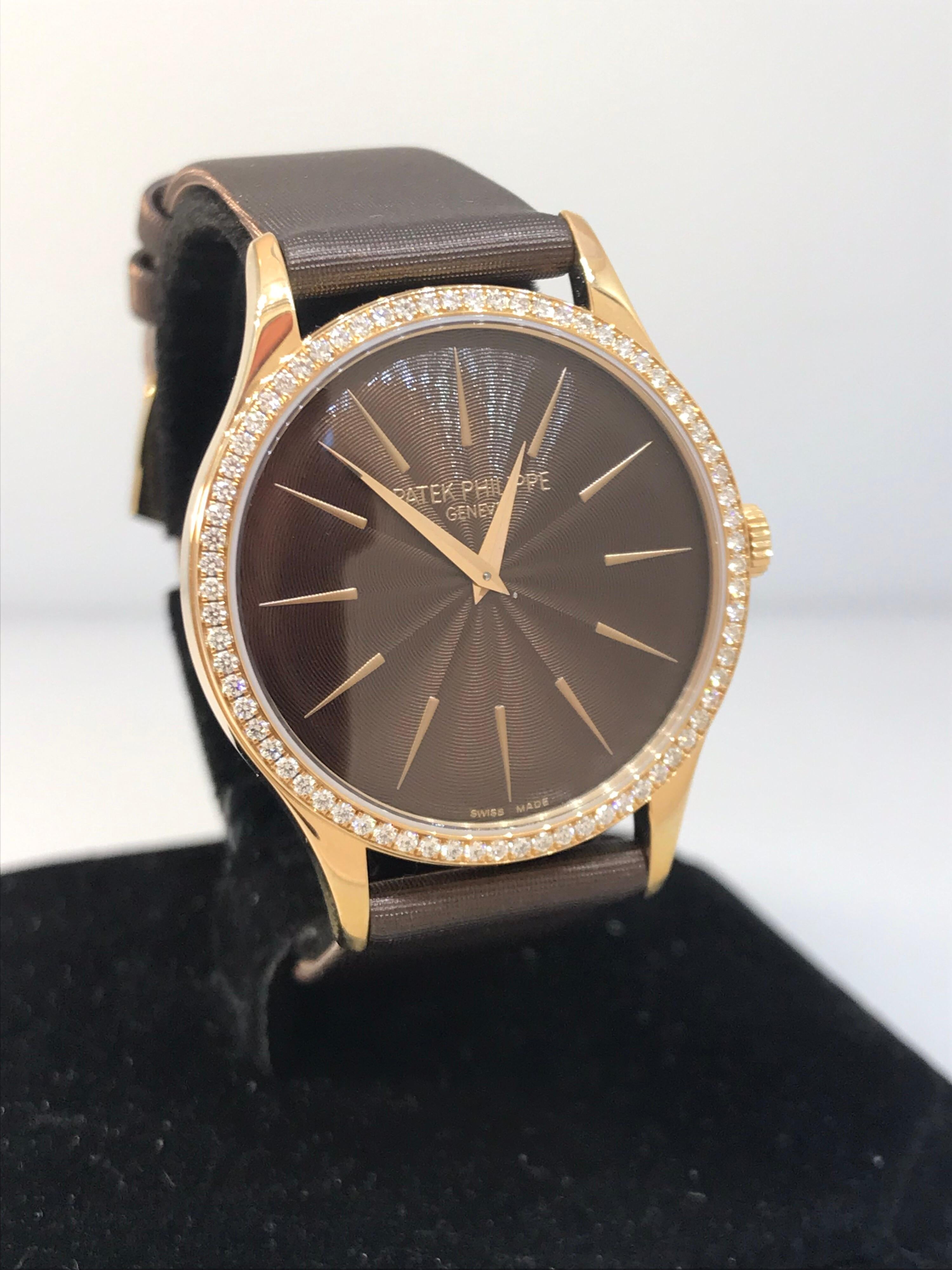 Patek Philippe Calatrava Ladies Watch

Model Number: 4897R-001

100% Authentic

Brand New

Comes with original Patek Philippe Box and Papers

18 Karat White Gold Case & Buckle

Diamond Bezel (72 Diamonds .47 Carats)  

Chocolate Brown Guilloched