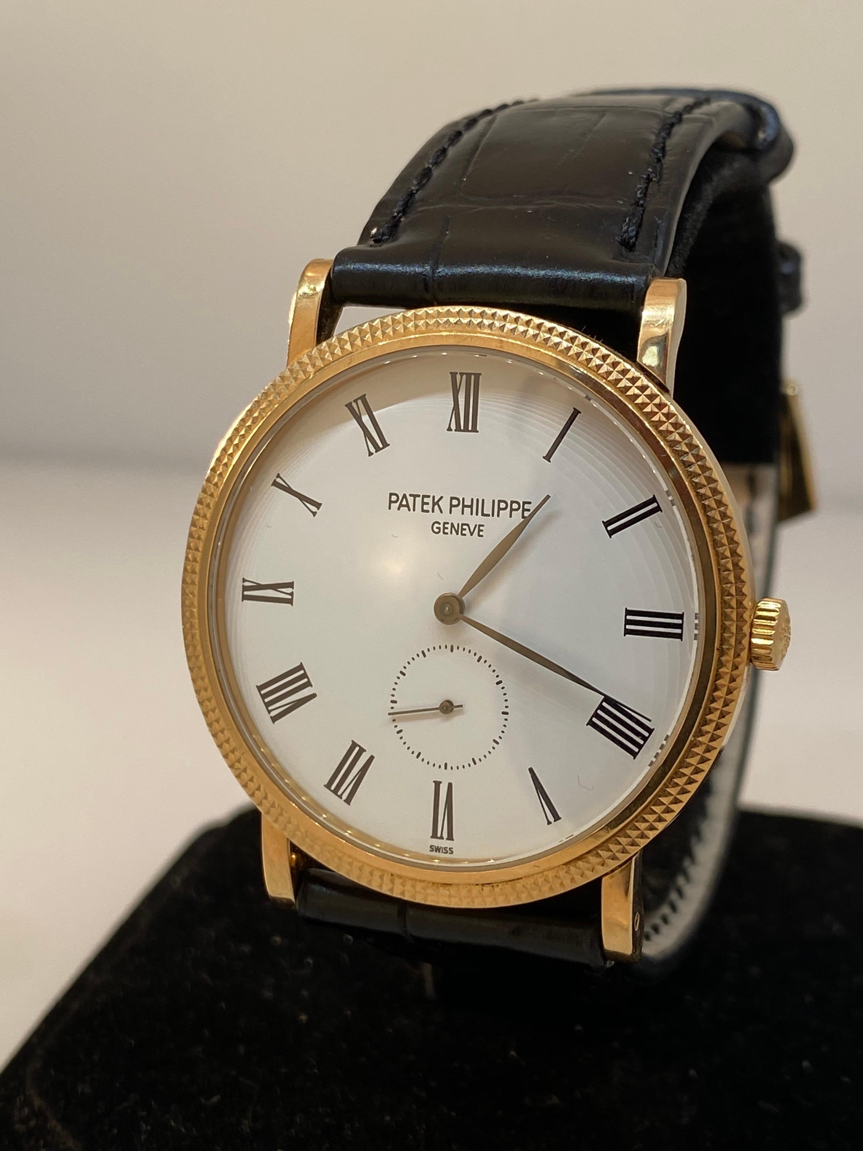 Patek Philippe Calatrava Rose Gold White Dial Leather Band Men's Watch 5119R In Excellent Condition For Sale In New York, NY