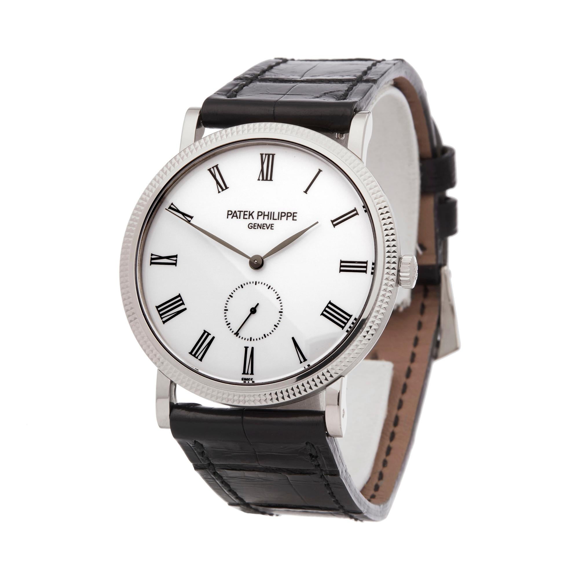 Ref: W6194
Manufacturer: Patek Philippe
Model: Calatrava 
Model Ref: 5119G-001
Age: 6th November 2017
Gender: Mens
Complete With: Box, Manuals, Guarantee & Holder 
Dial: White Roman 
Glass: Sapphire Crystal
Movement: Mechanical Wind
Water