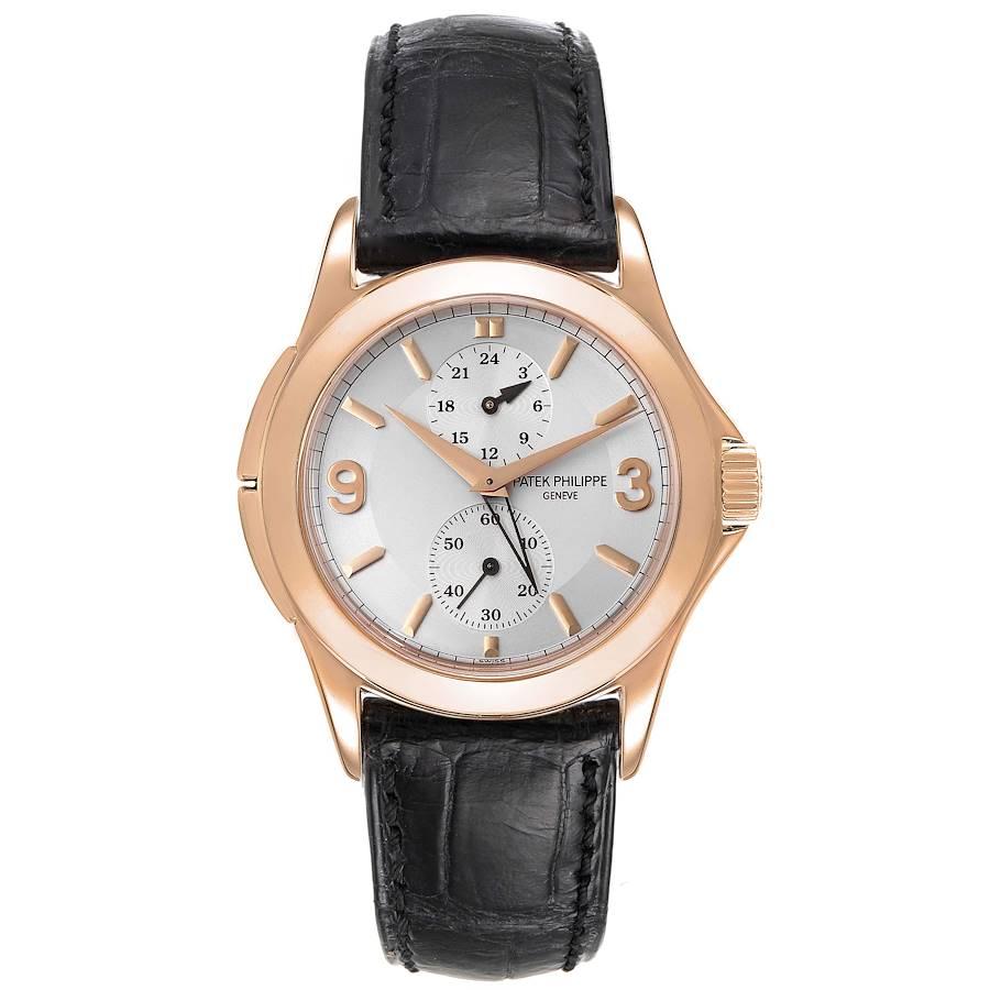 Patek Philippe Calatrava Travel Time Rose Gold Mens Watch 5134 Papers. Manual winding movement. 18k rose gold case 37.0 mm in diameter. Crown with protective shoulders, pusher at 10 and 8 o'clock to change time zone, screw-down sapphire crystal case